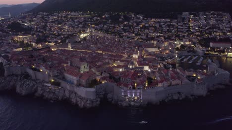Dubrovnik-old-town-aerial-view-at-dusk,-Croatia,-with-coastline-view