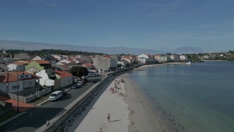 Aerial-shot-of-the-highway-along-the-coast-in-the-city-of-Praia-de-Ares,-Spain