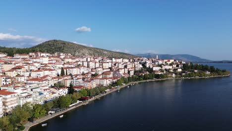Majestic-Aerial-Drone-Tour-of-Lake-Orestiada,-Kastoria,-Macedonia,-Greece