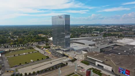 Aerial-establishing-shot-of-mirrored-Signia-Hilton-Hotel-in-Atlanta-City-at-daytime