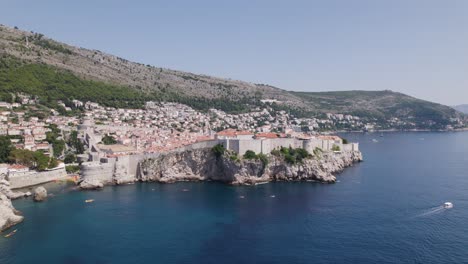 Aerial--Dubrovnik,-Croatia:-Coastal-cliffs,-old-town,-Adriatic-Sea-panorama