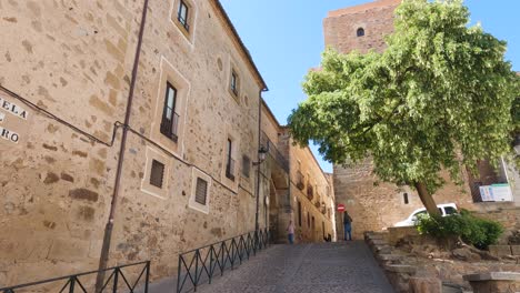 Picturesque-Old-Town-of-Caceres,-tilt-down-reveals-typical-historical-streets