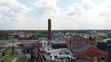 Aerial-shot-of-the-Żnin-Arche-Hotel-inside-old-sugar-factory-in-Poland