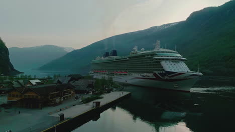 Aerial-view-of-a-Cruise-liner-docked-at-the-port-of-Flam,-sunset-in-Central-Norway
