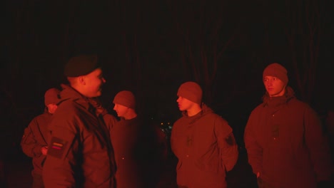 Group-of-conscripted-soldiers-in-firelight-at-Lithuanian-Independence-Restoration-Day