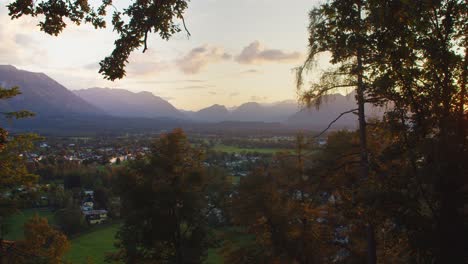 Panoramic-view-of-Salzburg-valley-with-mountains-on-background-at-sunset