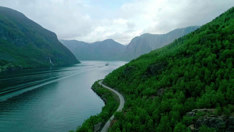 Summer-Aerial-View-of-Sognefjord-with-Road-and-Ship-in-distance,-overcast