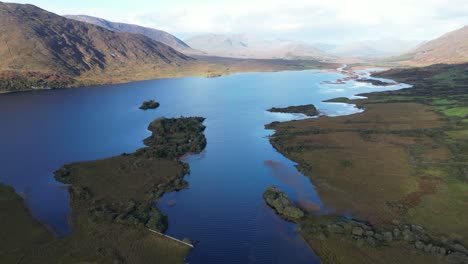 A-beautiful-aerial-view-of-the-waters-and-greenery-of-Connemara-Loop,-Galway-County,-Ireland