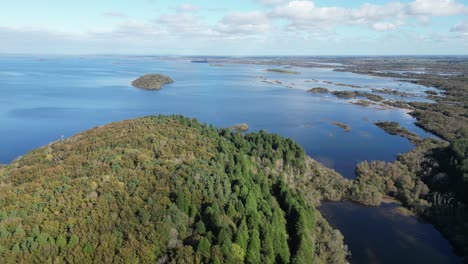 A-breathtaking-aerial-view-of-the-Clonbur-fishing-lakes-and-White-Island,-located-near-Connemara-National-Park-in-Galway-County,-Ireland