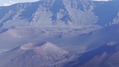 Cinematic-panning-shot-of-the-cinder-cones-craters-at-the-summit-of-Haleakala-on-the-Hawaiian-island-of-Maui