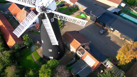 Aerial-footage-presents-the-charm-of-the-famous-Waltham-Windmill-and-Rural-History-Museum-in-Lincolnshire,-UK