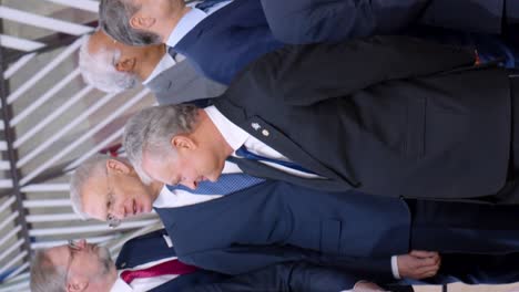 Vertical-video-portrait-of-European-Union-heads-of-state-and-government-gathering-at-the-European-Council-summit-in-Brussels,-Belgium---Panning-shot