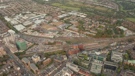 Circling-aerial-shot-of-Watford-station