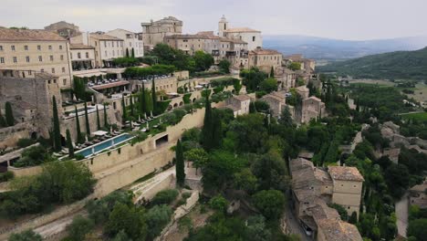 Aerial-view-of-ancient-village-of-Gordes-in-France-on-top-of-hill