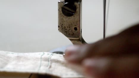 Sewing-machine-being-used-at-speed-to-create-clothing-product