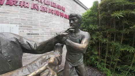 Bronze-statue-of-Bruce-Lee-with-his-master-depicting-training-process-near-Bruce’s-family-ancestral-house