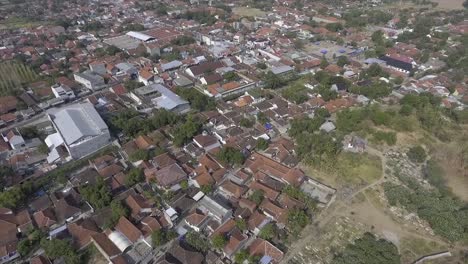 Aerial-view-of-the-densely-populated-residential-area-of-Ciledug-Village,-Cirebon-Regency,-West-Java,-Indonesia-seen-from-a-drone-or-top-view-which-is-the-border-between-West-Java-and-Central-Java