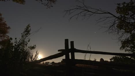 Moon-Rising-Over-Farm-Fence-In-Caledon,-Time-Lapse
