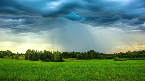Time-lapse-of-a-dramatic-sunset-clouds-and-a-rain-shower-moving-over-the-countryside