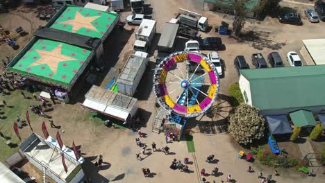 Yarrawonga,-Victoria,-Australia---7-October-2023:-Slowly-descending-aerial-of-the-Tornado-amusement-ride-at-the-Yarrawonga-Show-in-Victoria-Australia