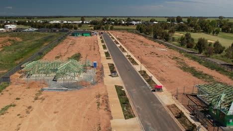 Yarrawonga,-Victoria,-Australia---20-October-2023:-Aerial-approaching-two-new-house-frames-at-Silverwoods-Estate-Yarrawonga,-Victoria,-Australia