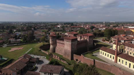 Rocca-Sforzesca-di-Soncino,-Cremona,-Italy,-midday,-autumn,-drone