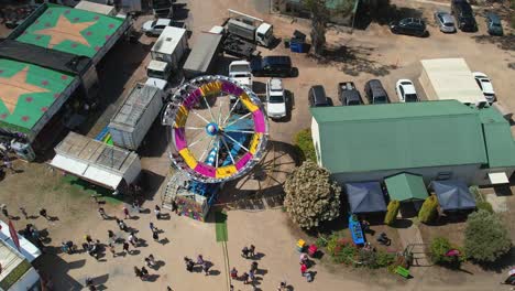 Yarrawonga,-Victoria,-Australia---7-October-2023:-People-watching-the-Tornado-amusement-ride-spinning-at-the-Yarrawonga-Show-in-Victoria-Australia