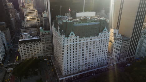 Drone-shot-orbiting-the-Chateau-style-Plaza-hotel,-in-New-York,-USA