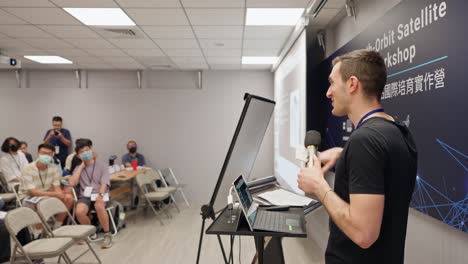 Man--Lecturing-Students-During-Workshop-Seminar