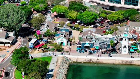 Seaport-Village-aerial-view-of-the-shops,-restaurants,-and-lots-of-people-walking-around-in-San-Diego-California