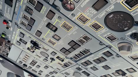 Close-up-view-of-the-overhead-panel-of-an-aircraft-in-flight