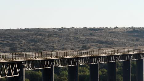 Establishing:-Birds-fly-at-old-wagon-bridge-near-Hopetown-South-Africa