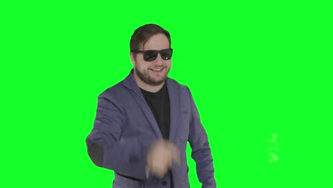 successful-brilliant-caucasian-bearded-male-wearing-black-sunglasses-happy-smiling-in-front-of-camera-with-green-screen-alpha-channel-background