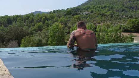 relaxing-in-an-infinity-pool-with-views