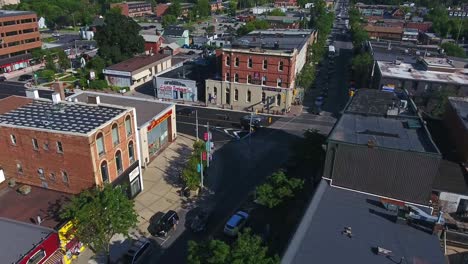 Aerial-View-Over-Whitby-Town-Intersection-with-Town-Buildings-Along-Dundas-and-Brock-Street-in-Ontario,-Canada