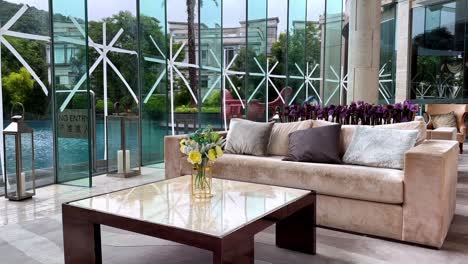 Interior-of-a-Spacious-Luxurious-Living-Room-with-Taped-Floor-to-Ceiling-Windows
