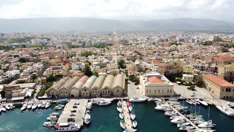 Bright-and-beautiful-town-of-Chania,-aerial-drone-view