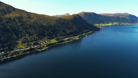 Aerial-over-Syvdsfjorden-near-Syvde-on-a-lovely-sunny-day,-Vanylven-Municipality,-Norway
