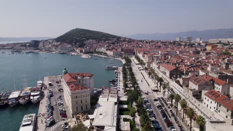 Split,-Croatia:-Aerial-view-of-the-harbor,-waterfront-promenade-and-historic-city