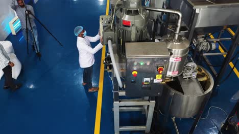 aerial-camera-moves-in-close-up-showing-the-entire-plant-at-a-peanut-butter-manufacturing-company