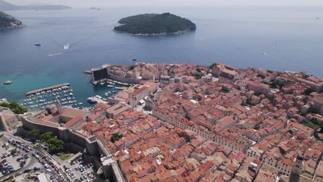 Aerial-view-of-the-medieval-city-walls-and-the-old-town-of-Dubrovnik,-Croatia