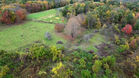 Aerial-view-of-the-beautifully-colored-fall-foliage-on-a-rainy-day-in-Western-Massachusetts