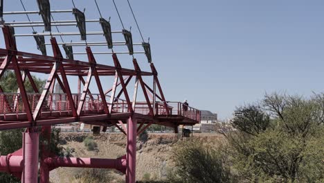 Tourist-enjoys-view-of-Big-Hole-Mine,-Kimberley-from-viewing-platform