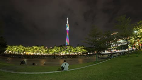 Timelapse-of-Guangzhou-downtown-park-recreation-area-with-people-passing-by-at-late-evening