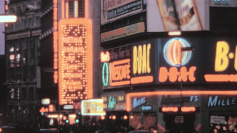 Illuminated-Signs-at-Night-at-Piccadilly-Circus-in-London-1970s