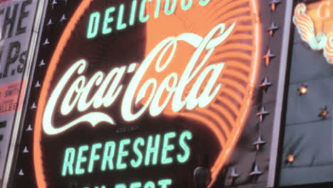 Coca-Cola-Sign-Illuminated-with-Neon-Lights-at-Piccadilly-Circus-in-London-1970s
