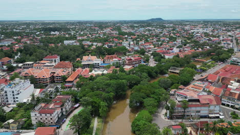 Siem-Reap-River-and-Township-Rise-and-Track-Forward-4K
