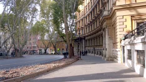Walking-on-the-sidewalk-of-the-roman-street-"Via-Vittorio-Veneto