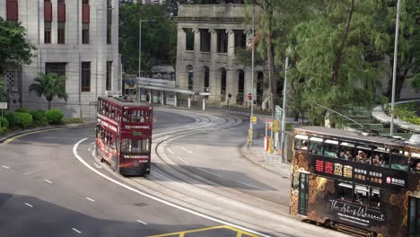Double-decker-trams-on-the-street-of-Kings-Road,-Hongkong,-China