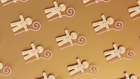 Gingerbread-Men-and-Candy-Canes-on-a-yellow-background-vertical